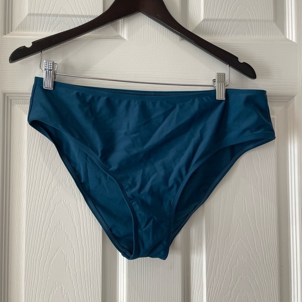 Woman’s blue bikini bottoms